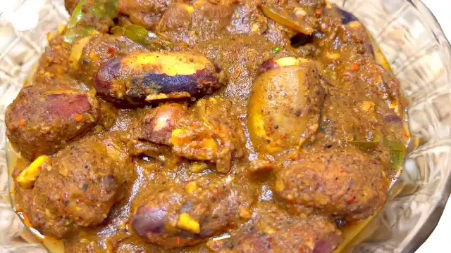 Spicy Kos Ata Kalu Pol Curry prepared the traditional way