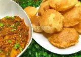 Oconut Puri With Potato Masala Curry